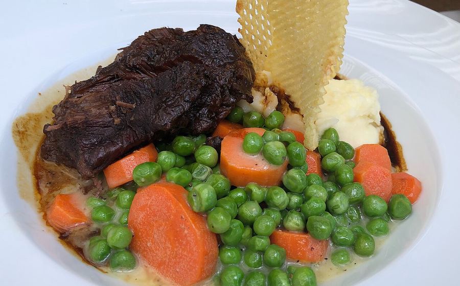 Cooked beef with peas and carrots (representative photo)