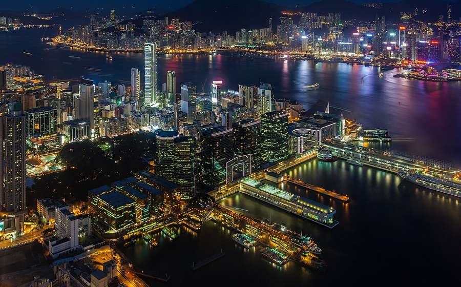 Victoria Harbour and the Hong Kong Island skyline at night